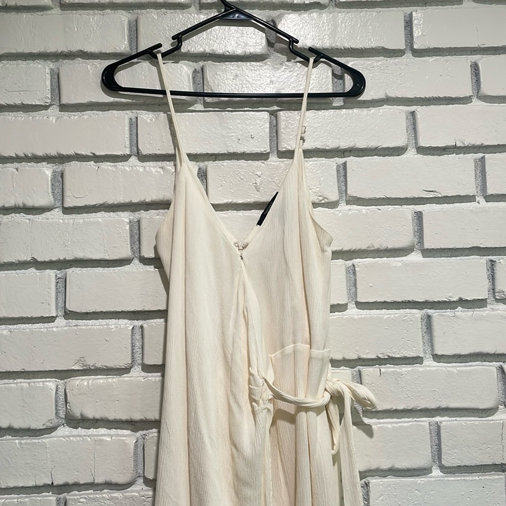 Beige romper size medium